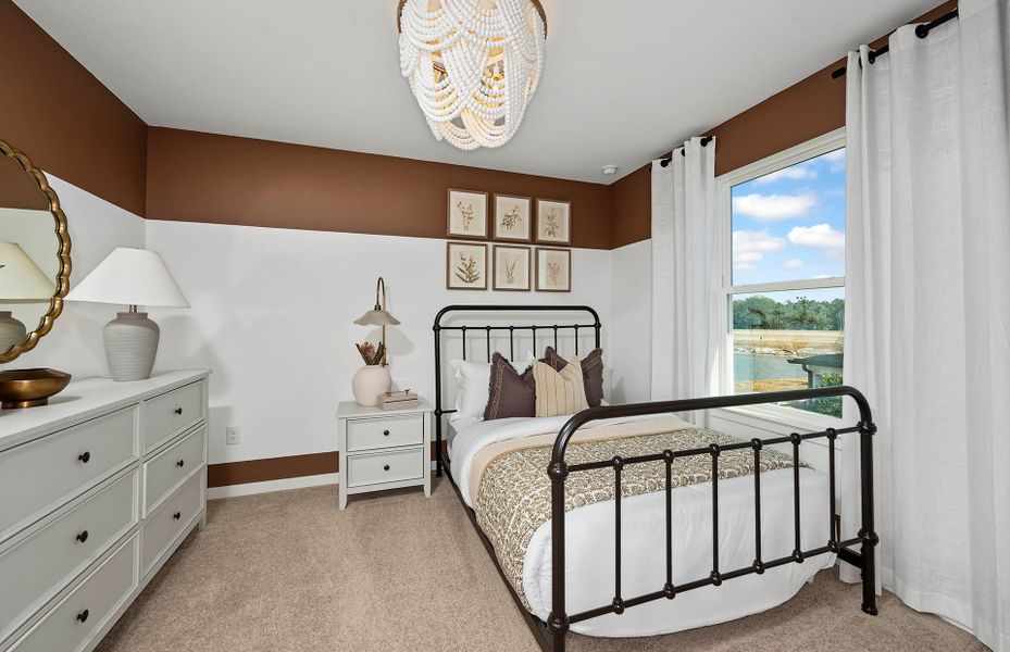 Representative furnished interior of a home built from the Pinecrest by Pulte Homes in Riversong, Parrish (Image 18).