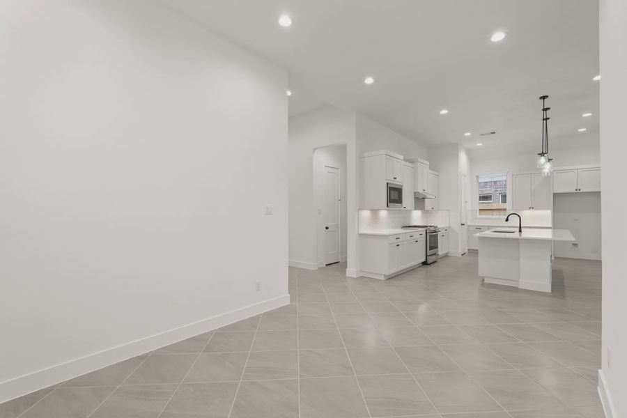 Representative unfurnished interior of a home built from the Palmer by Chesmar Homes in Riceland Alley Loads, Mont Belvieu (Image 38).