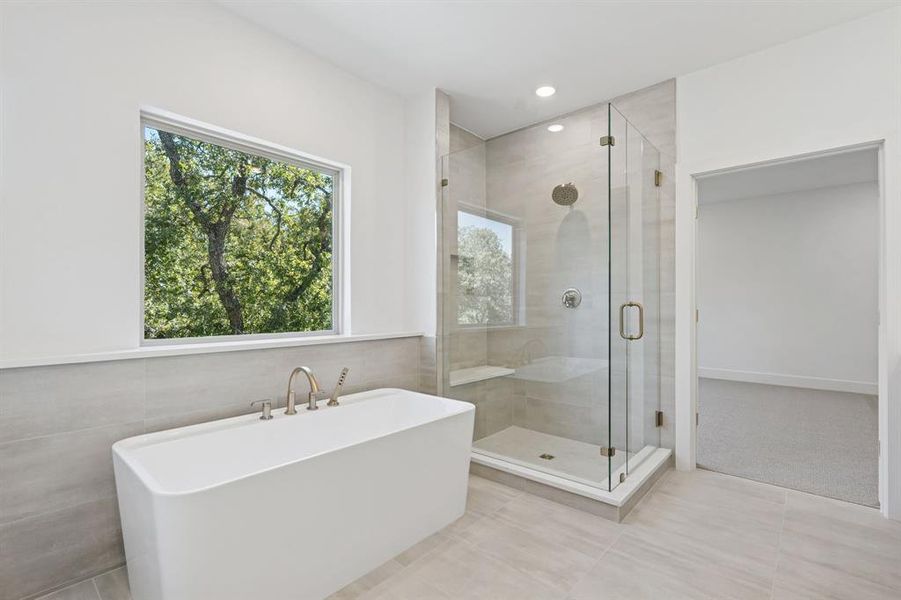 Separate tub and shower.