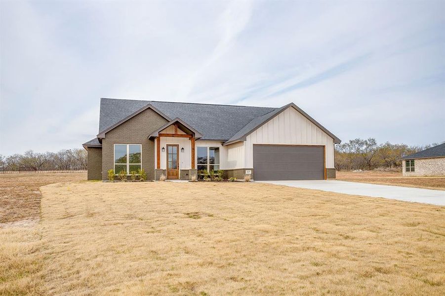 Front exterior of a new home in , Millsap, TX, highlighting curb appeal (Image 1). Front exterior of a new home in , Millsap, TX, highlighting curb appeal (Image 1).
