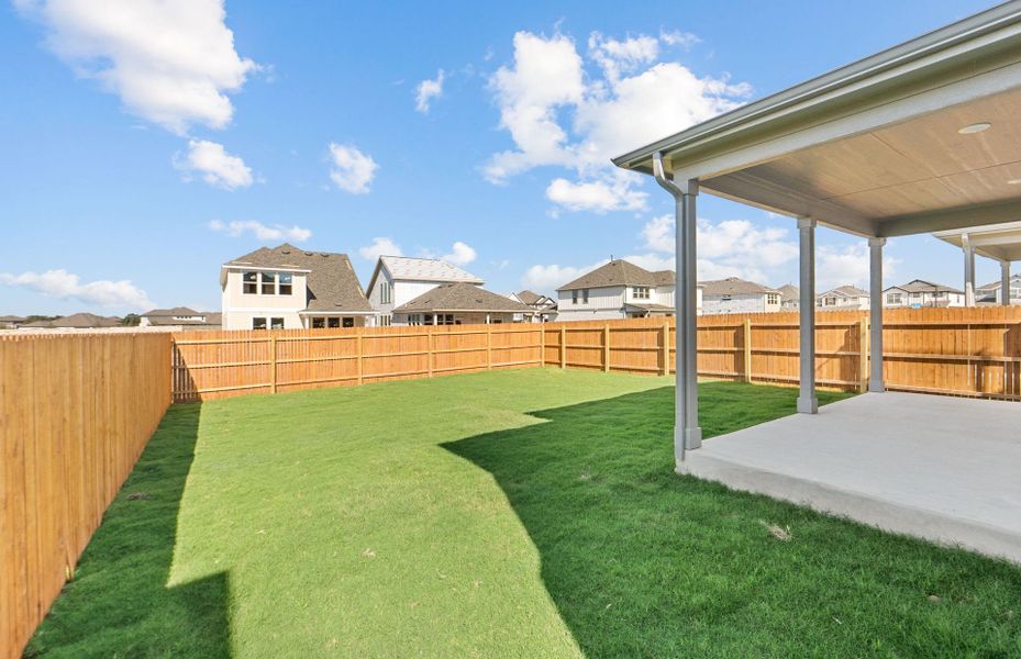 Exterior details and patio area of a home in Santa Rita Ranch, Liberty Hill (Image 23). Exterior details and patio area of a home in Santa Rita Ranch, Liberty Hill (Image 23).