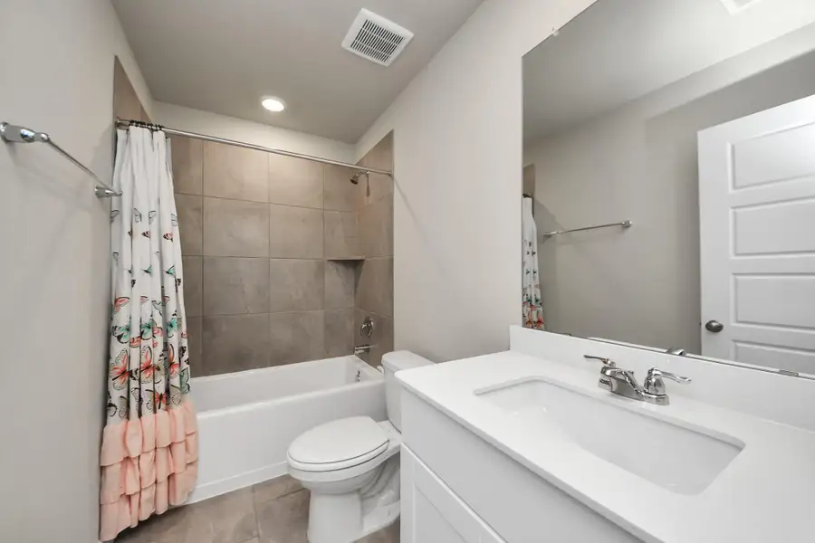 Furnished interior view inside a new home in Heights of Barbers Hill, Baytown (Image 5).