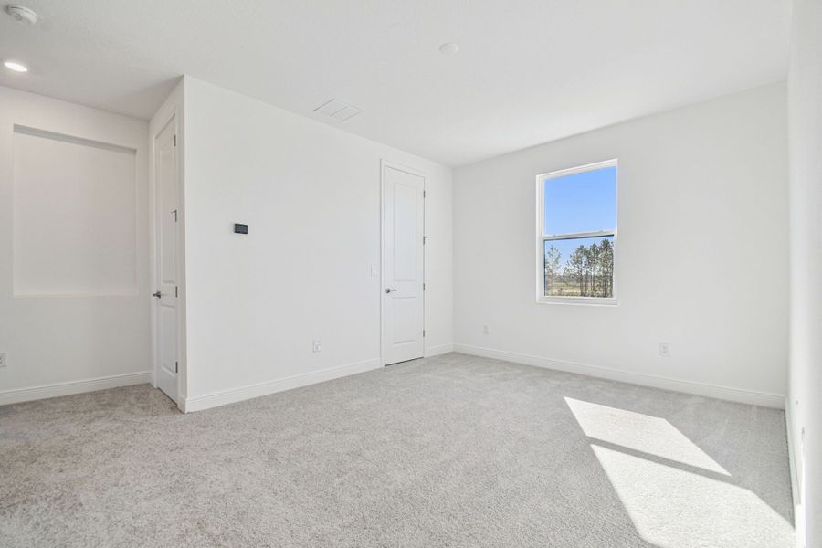 Representative unfurnished interior of a home built from the 50 ' - Saratoga by William Ryan Homes in Tamarack at Two Rivers, Zephyrhills (Image 59).