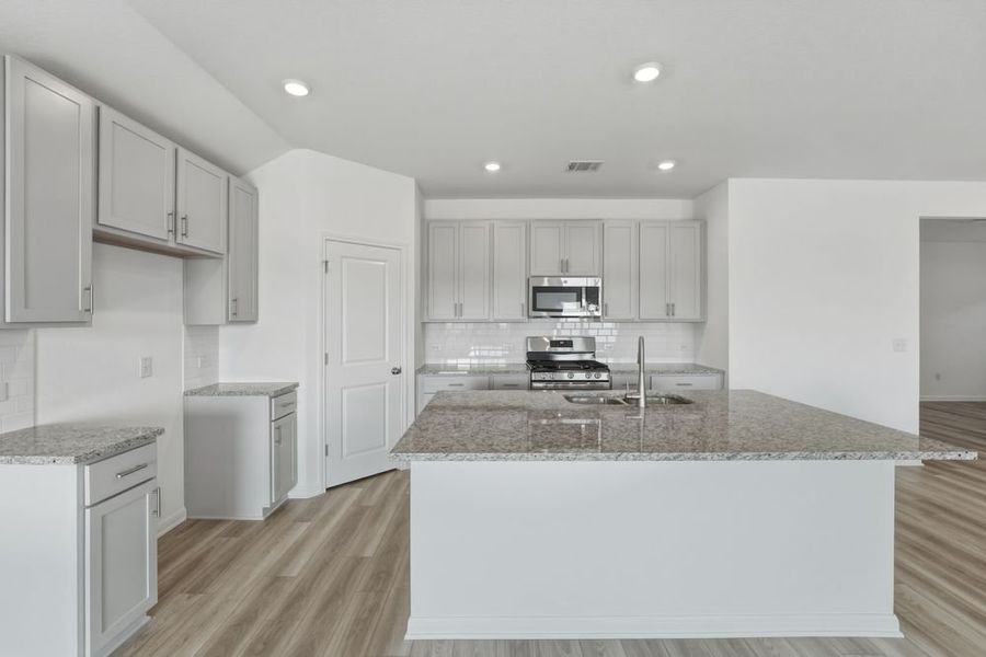 Furnished interior view inside a new home in Longview, Del Valle (Image 4).