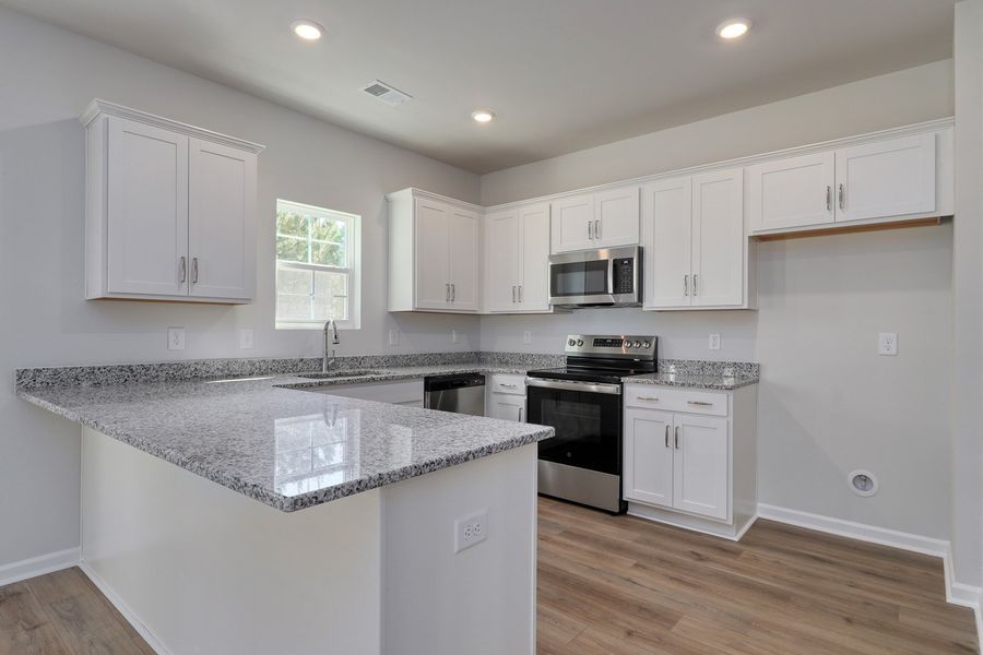 Furnished interior view inside a new home in Hainer Place, Conway (Image 5).