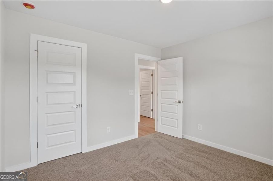 Spacious, unfurnished interior of a new home in The Fairways at Mirror Lake, Villa Rica (Image 61).