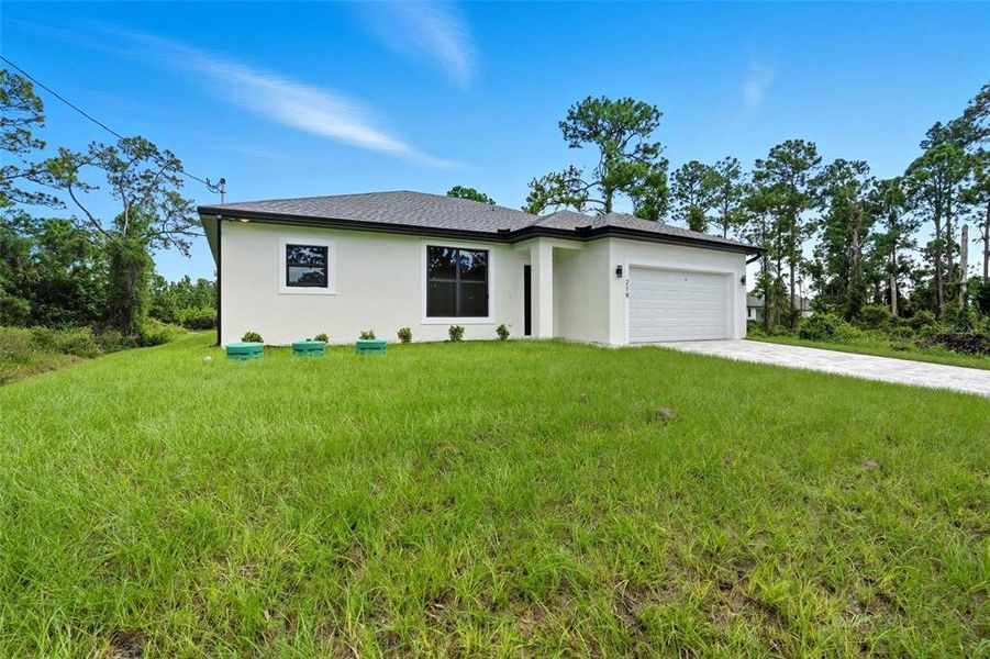Exterior details and patio area of a home in , Lehigh Acres (Image 2).