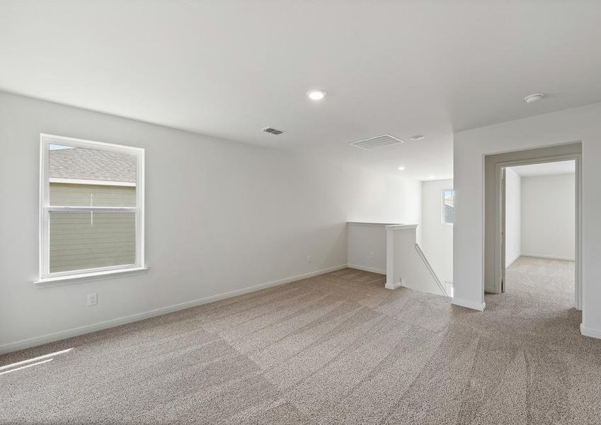 The upstairs loft is the perfect space for a gameroom.