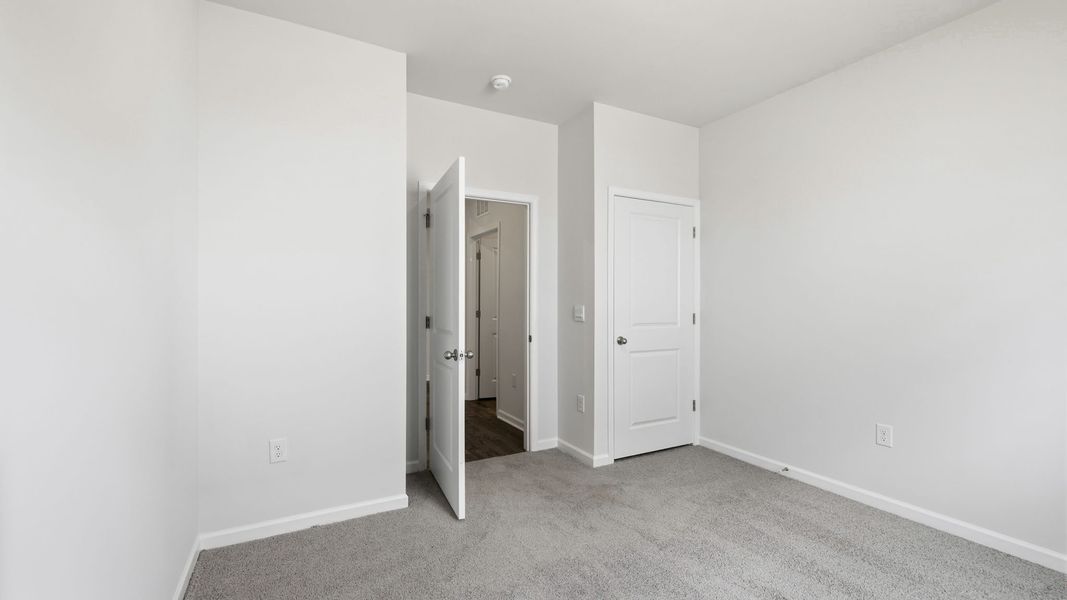 Spacious, unfurnished interior of a new home in Valleywood Farms, Waynesville (Image 21).