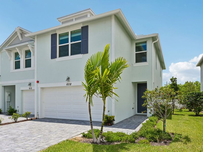 Front exterior of a new home in Tidewater, Fort Pierce, FL, highlighting curb appeal (Image 18). Front exterior of a new home in Tidewater, Fort Pierce, FL, highlighting curb appeal (Image 18).