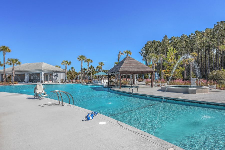 Front exterior of a new home in Del Webb Charleston at Nexton, Summerville, SC, highlighting curb appeal (Image 24). Front exterior of a new home in Del Webb Charleston at Nexton, Summerville, SC, highlighting curb appeal (Image 24).