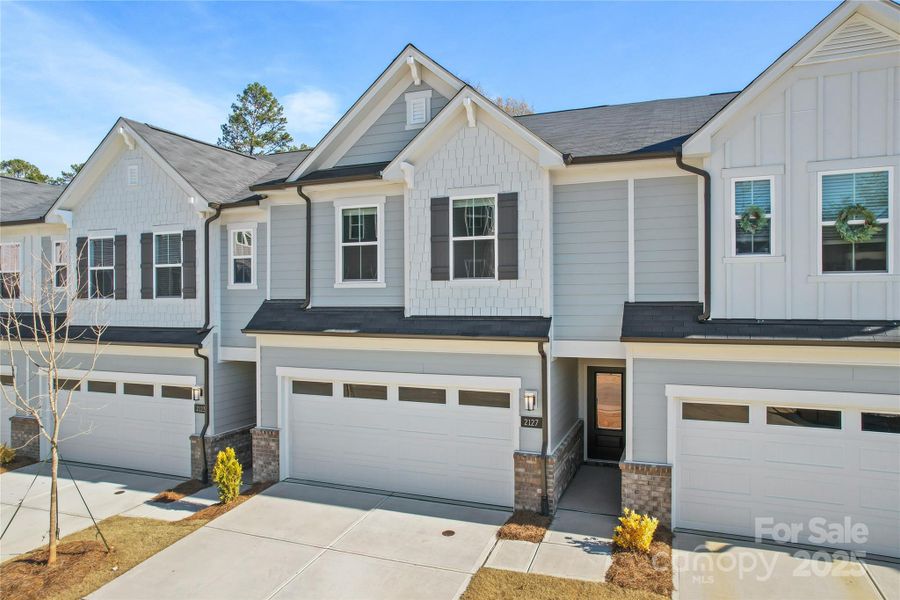 Front exterior of a new home in Galloway Towns, Charlotte, NC, highlighting curb appeal (Image 20). Front exterior of a new home in Galloway Towns, Charlotte, NC, highlighting curb appeal (Image 20).