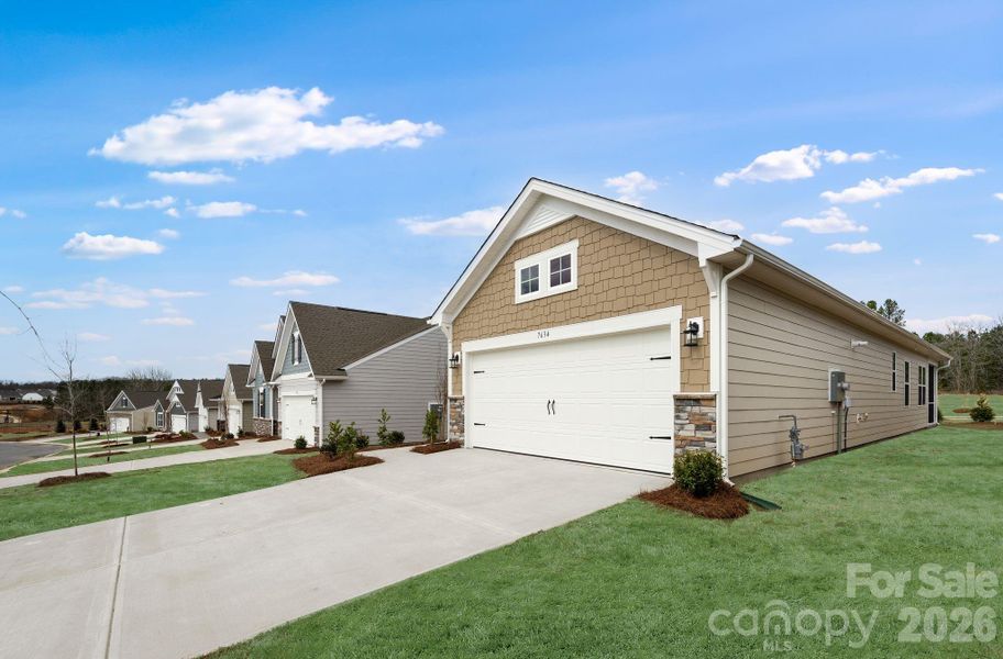 Front exterior of a new home in Roselyn, Lancaster, SC, highlighting curb appeal (Image 2). Front exterior of a new home in Roselyn, Lancaster, SC, highlighting curb appeal (Image 2).