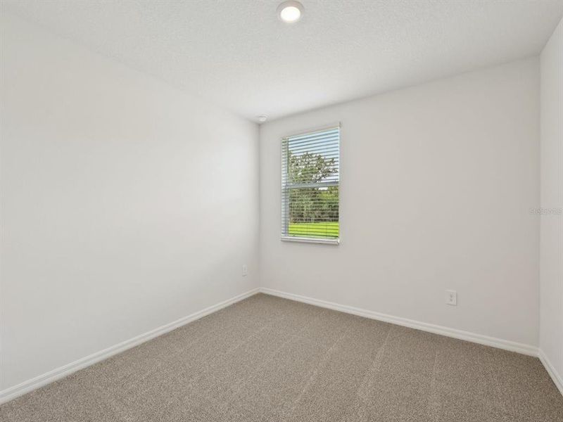 Spacious, unfurnished interior of a new home in The Reserve at Van Oaks, Auburndale (Image 14).