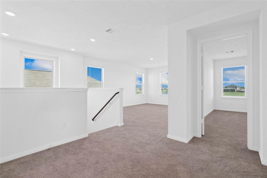 Upstairs, the Loft is oversized and offers plenty of space for additional living space. Upstairs, the Loft is oversized and offers plenty of space for additional living space.