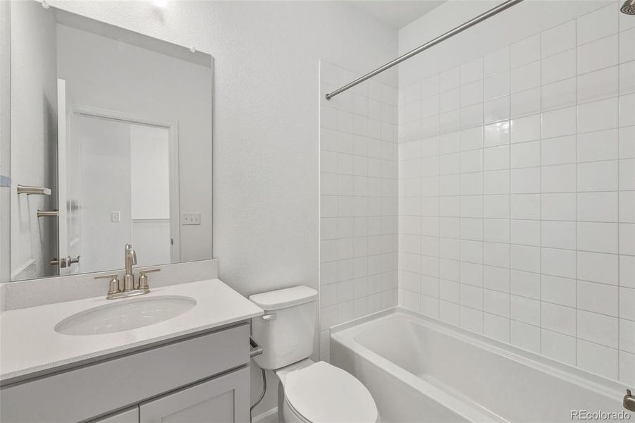 Furnished interior view inside a new home in The Cottages Collection at Ridgeline Vista, Brighton (Image 7).