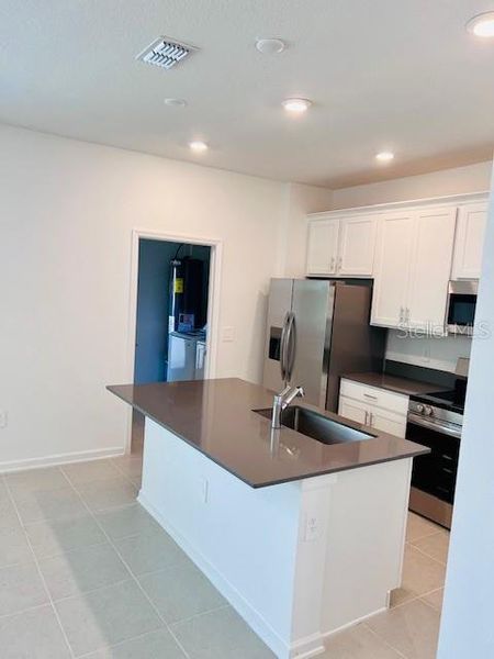 Furnished interior view inside a new home in , Kissimmee (Image 10). Furnished interior view inside a new home in , Kissimmee (Image 10).