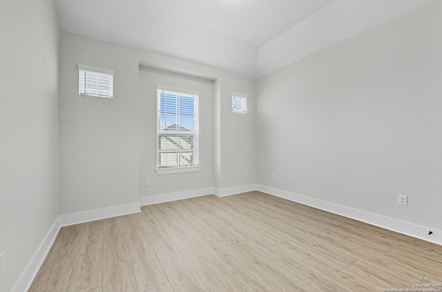 Spacious, unfurnished interior of a new home in The Reserve at Potranco Oaks, Castroville (Image 22).