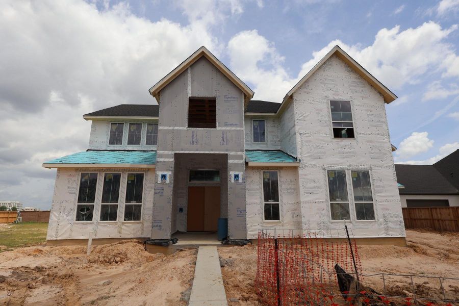 In-progress construction of a new home in Dunham Pointe, Cypress, TX (Image 29).