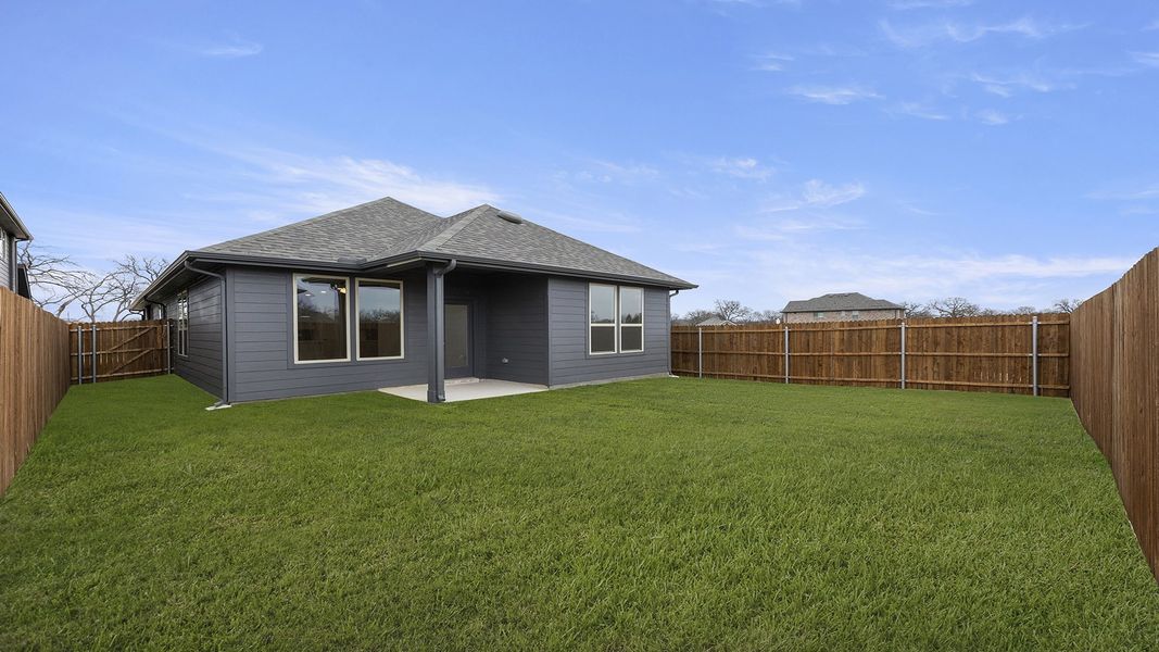Exterior details and patio area of a home in Keeneland 40s, Aubrey (Image 22).