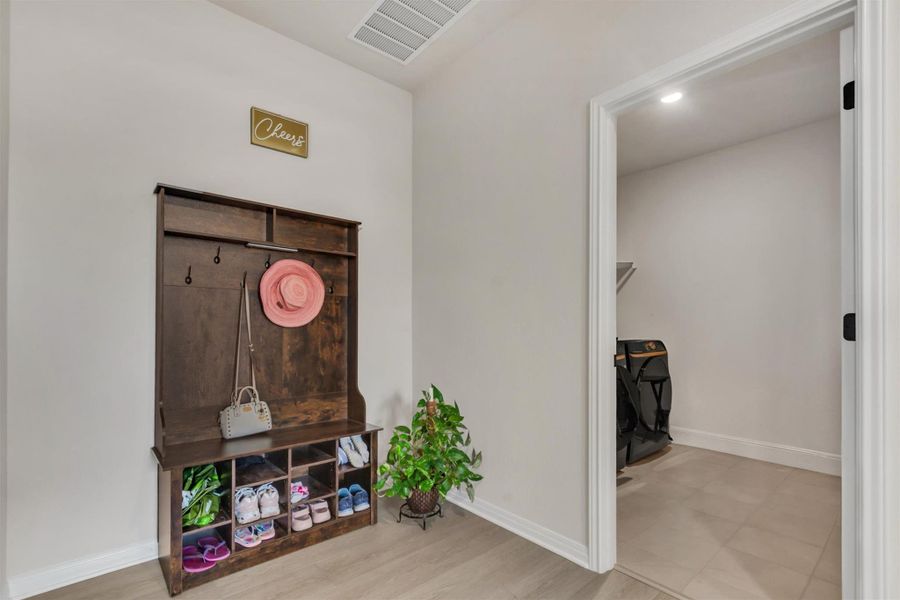 Large mud room area, just off of the garage is a perfect spot for backpacks, leashes, shoes and so much more Large mud room area, just off of the garage is a perfect spot for backpacks, leashes, shoes and so much more