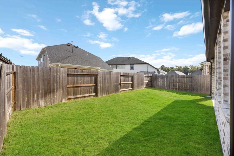 Front exterior of a new home in , Conroe, TX, highlighting curb appeal (Image 2). Front exterior of a new home in , Conroe, TX, highlighting curb appeal (Image 2).