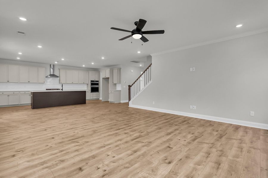Spacious, unfurnished interior of a new home in Tidewater at Lakes of Cane Bay, Summerville (Image 21).