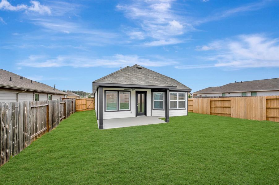 Exterior details and patio area of a home in Magnolia Ridge, Magnolia (Image 17).