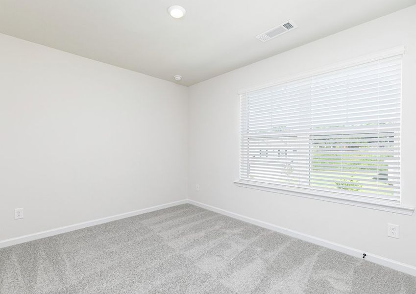 Each bedroom includes carpet, a closet and a bright, open window