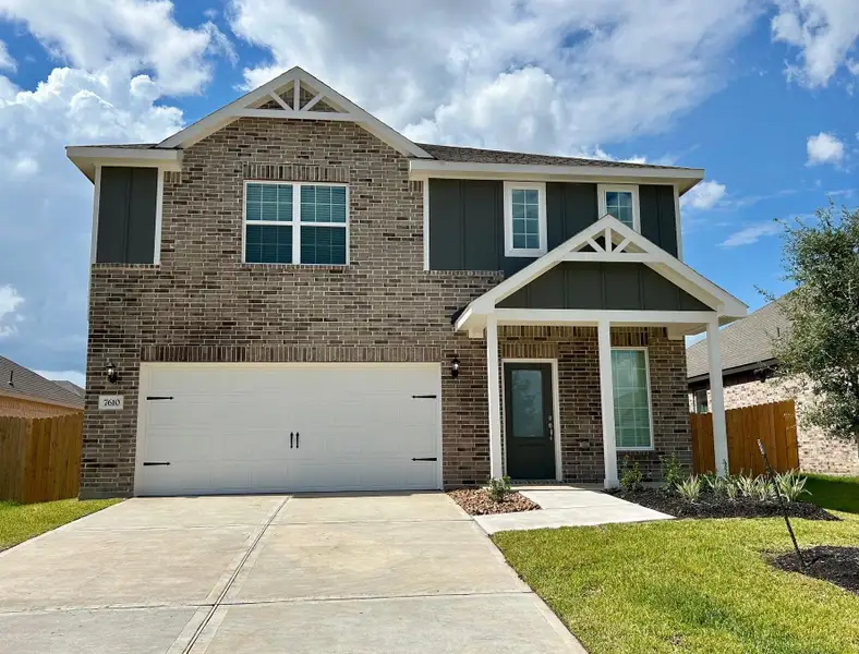 Front exterior of a new home in Vacek Country Meadows, Richmond, TX, highlighting curb appeal (Image 1). Front exterior of a new home in Vacek Country Meadows, Richmond, TX, highlighting curb appeal (Image 1).