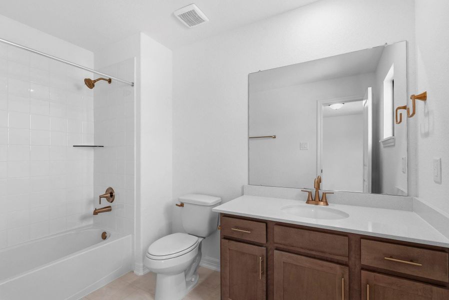 Furnished interior view inside a new home in Spring Creek Trails, Magnolia (Image 11).
