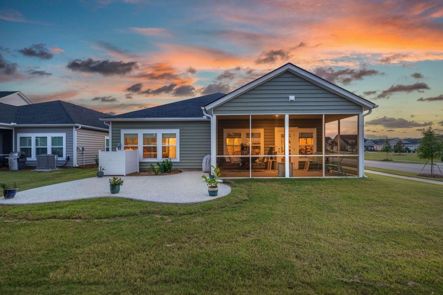 Front exterior of a new home in Horizons at Summers Corner | 55+: The Legends, Summerville, SC, highlighting curb appeal (Image 19).