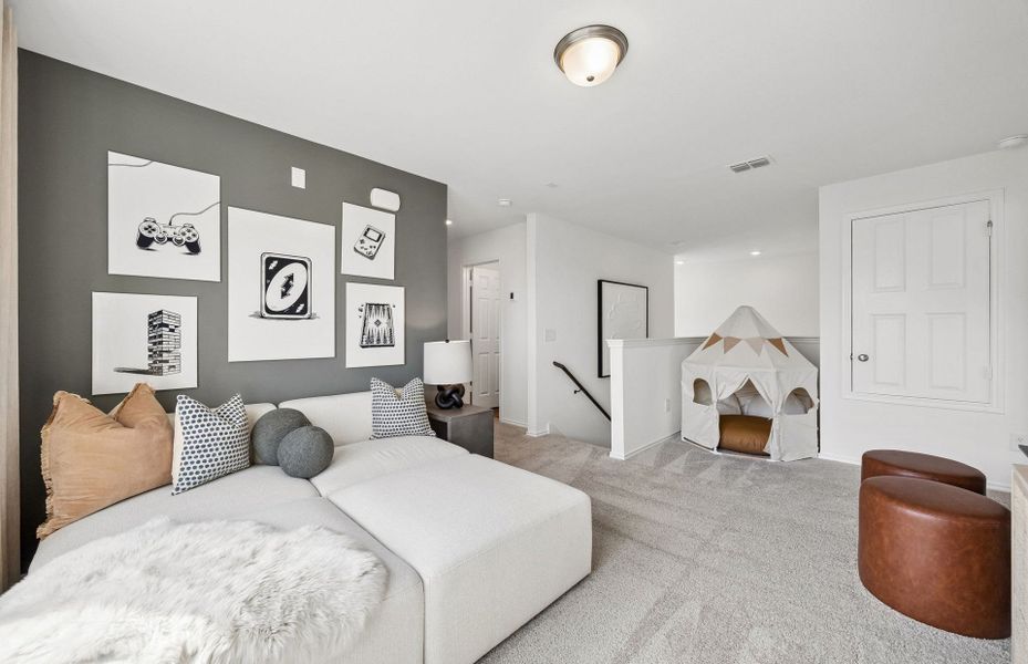 Representative furnished interior of a home built from the Camelia by Pulte Homes in Saddleback at Santa Rita Ranch, Liberty Hill (Image 9).