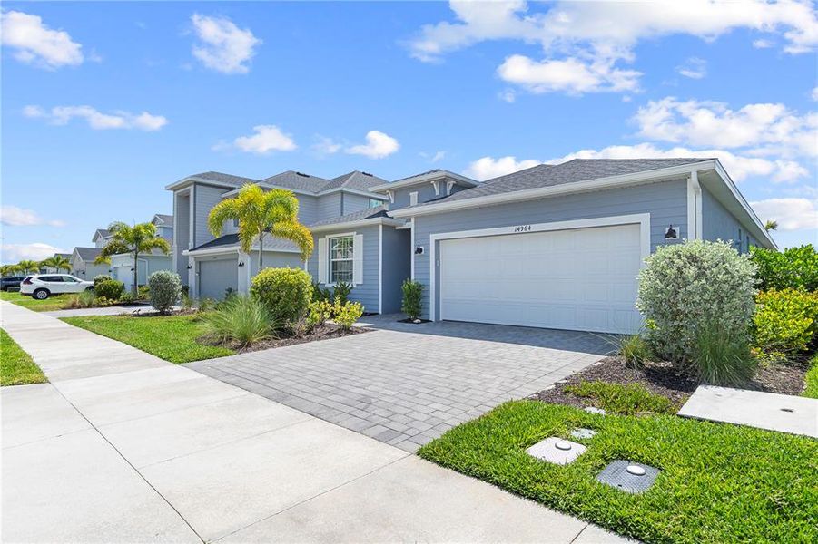 Front exterior of a new home in , Punta Gorda, FL, highlighting curb appeal (Image 23). Front exterior of a new home in , Punta Gorda, FL, highlighting curb appeal (Image 23).