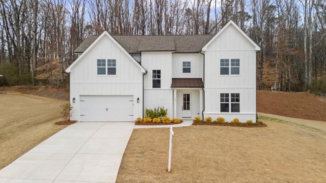 Front exterior of a new home in , Canton, GA, highlighting curb appeal (Image 29).