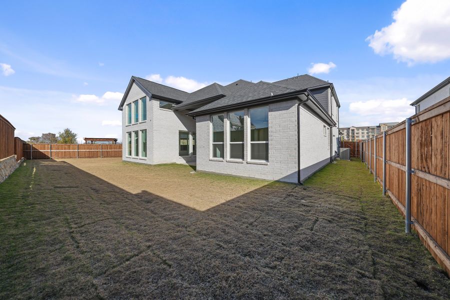 Exterior details and patio area of a home in Estates at Rockhill, Frisco (Image 30). Exterior details and patio area of a home in Estates at Rockhill, Frisco (Image 30).