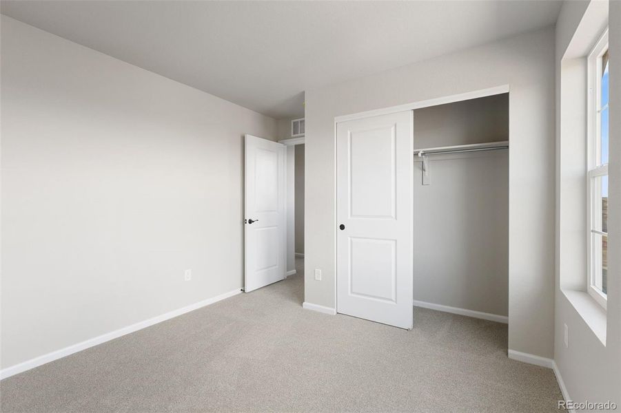 Spacious, unfurnished interior of a new home in The Legacy Collection at Talon Pointe, Thornton (Image 24).