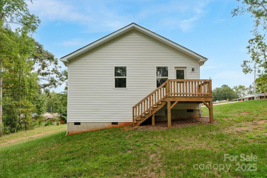 Front exterior of a new home in , Forest City, NC, highlighting curb appeal (Image 12).