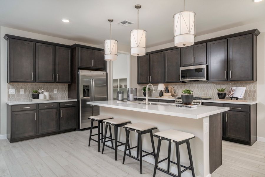 Representative furnished interior of a home built from the Monument by Risewell Homes in Citrus Park, Goodyear (Image 9).