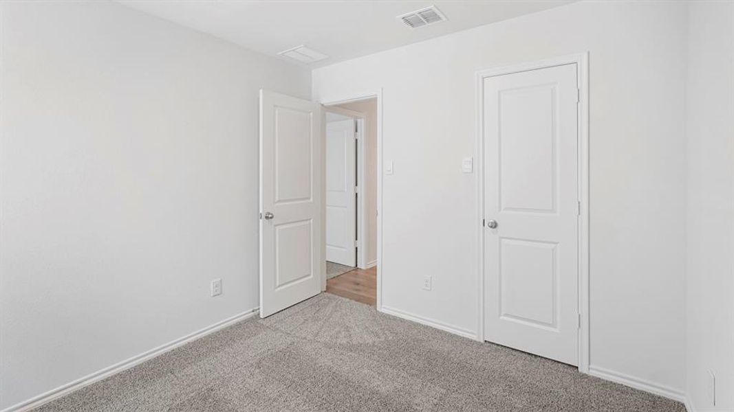 Neutral white walls provide a versatile backdrop for personalization