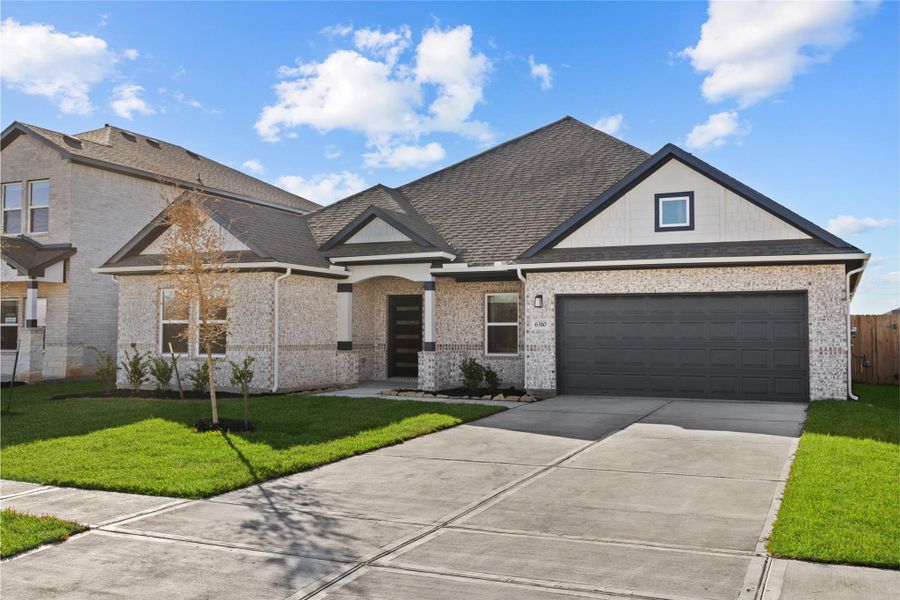 Front exterior of a new home in Ashland, Angleton, TX, highlighting curb appeal (Image 18).