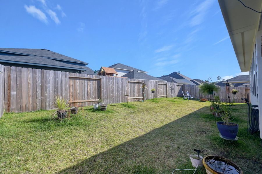 Exterior details and patio area of a home in Glen Oaks, Magnolia (Image 23).