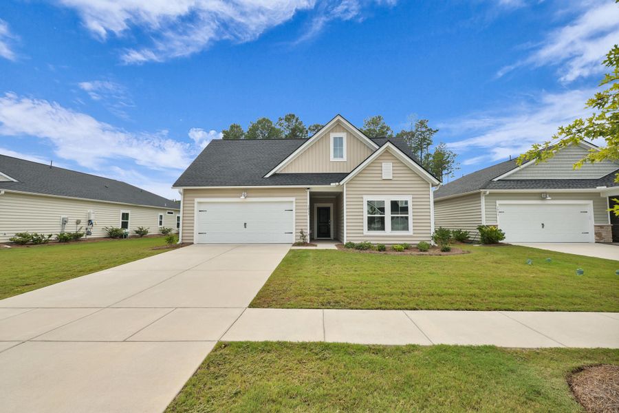 Front exterior of a new home in , Summerville, SC, highlighting curb appeal (Image 26).