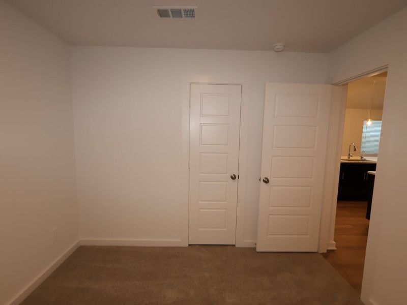 Spacious, unfurnished interior of a new home in Pinewood at Grand Texas, New Caney (Image 10).