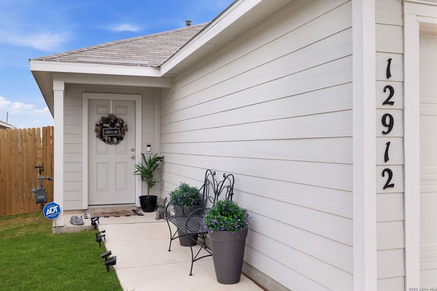 Exterior details and patio area of a home in Spring Grove, St. Hedwig (Image 21).