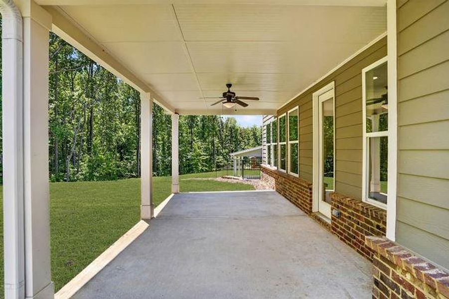 Exterior details and patio area of a home in The Manor at Gainesville Township, Gainesville (Image 4).