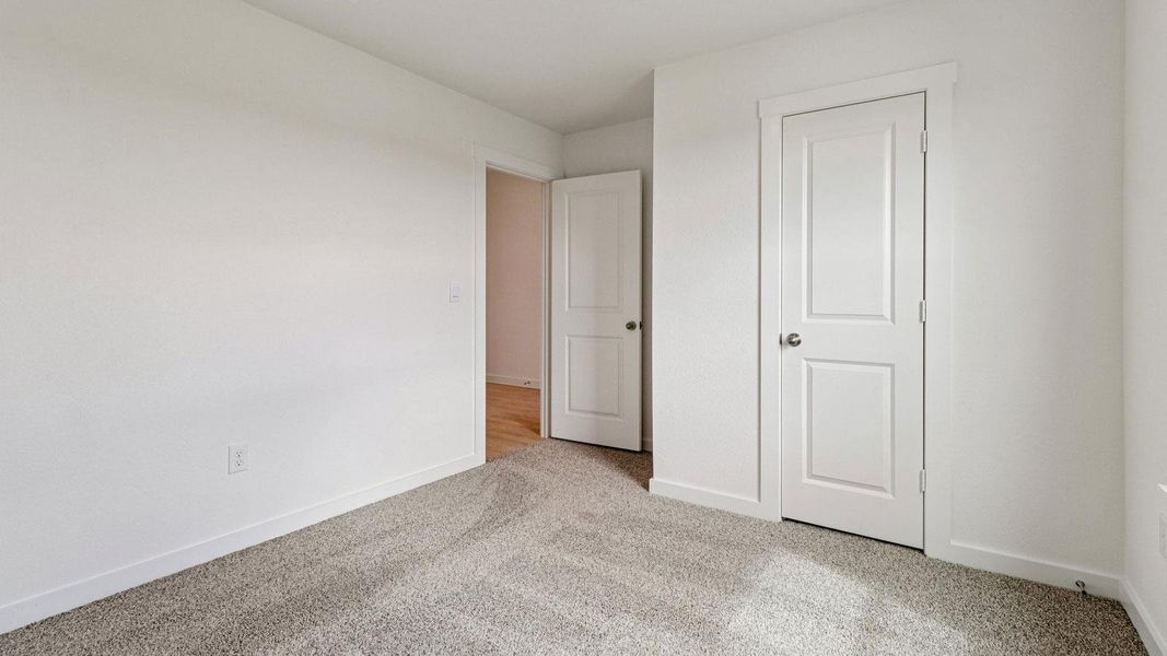 Spacious, unfurnished interior of a new home in Monarch Ranch, Manor (Image 13).