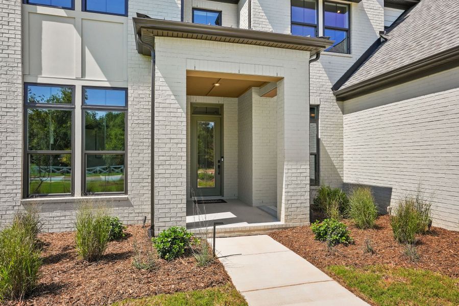 Representative exterior details of a home built from the Hampton by John Wieland in McCoy Farm, Wesley Chapel (Image 34).