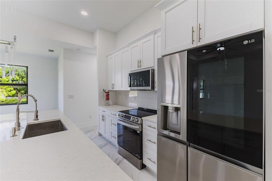 Furnished interior view inside a new home in , Cape Coral (Image 9). Furnished interior view inside a new home in , Cape Coral (Image 9).