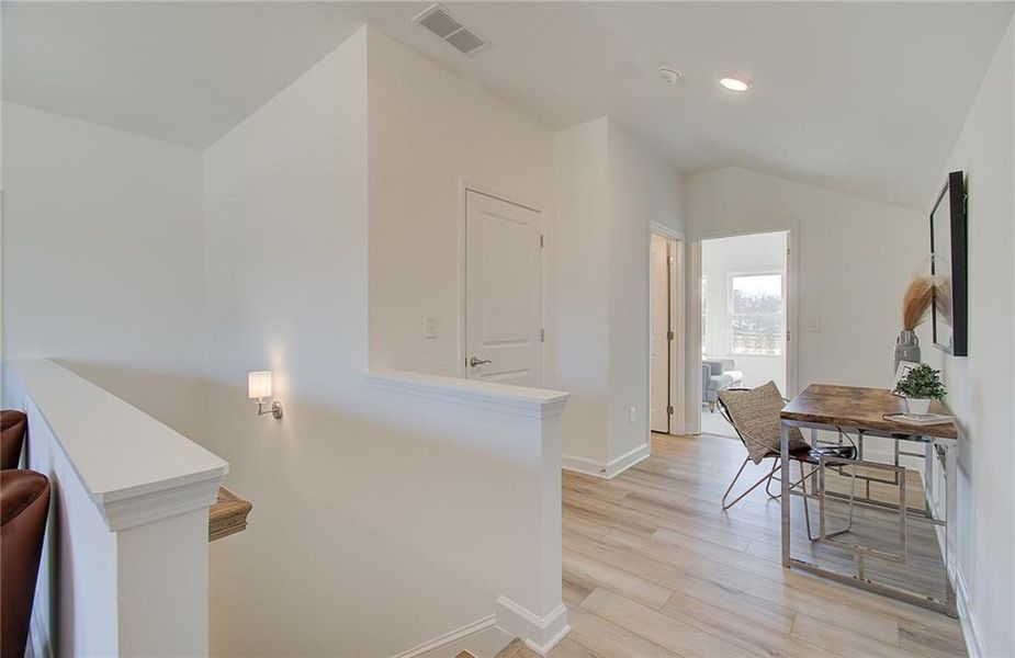Furnished interior view inside a new home in Courtyards at Traditions, Cumming (Image 36).